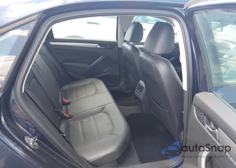 2014 Volkswagen Passat 1.8T Wolfsburg Edition z USA, uszkodzony, nr VIN 1VWAT7A31EC080361